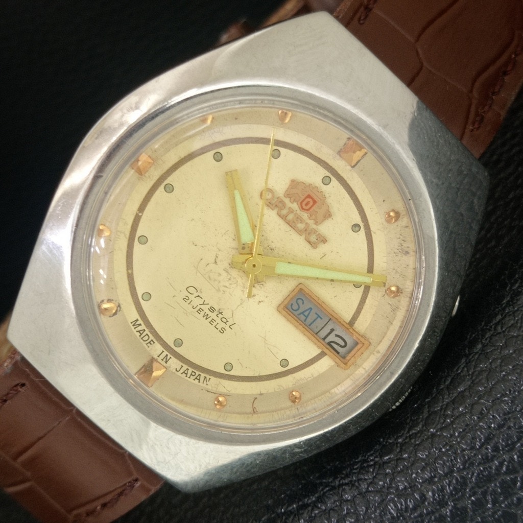 Vintage 1979 Orient Automatic Mens Silver Watch WDaydate  Gold Accents